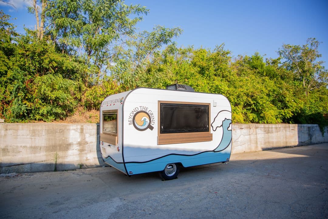 Rebecca Scussel with their Aero Build trailer